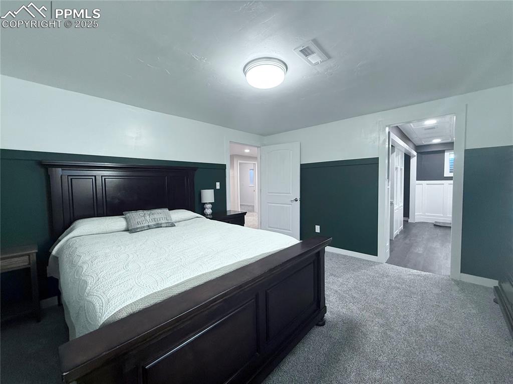 Image 22 of 38: Bedroom