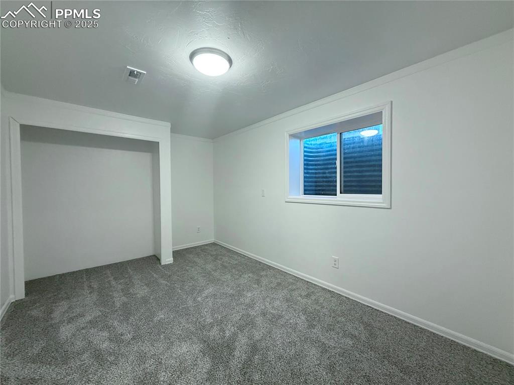 Image 29 of 38: Bedroom