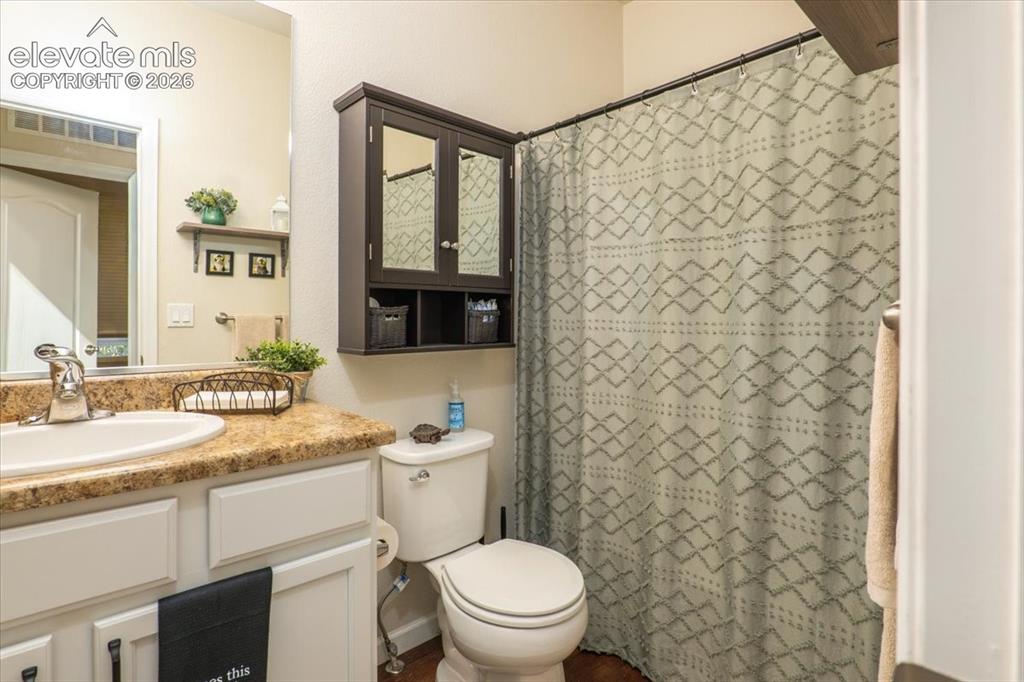 Image 11 of 50: Hall bath, main level