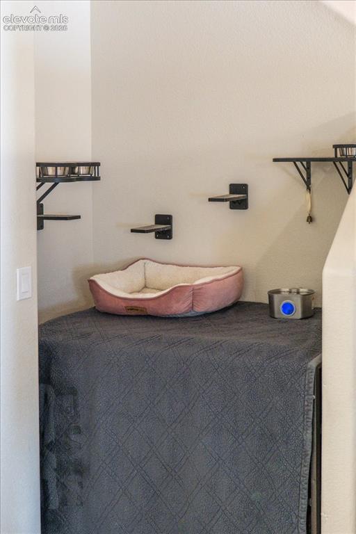 Image 14 of 50: Alcove left of stairs, pet hangout 