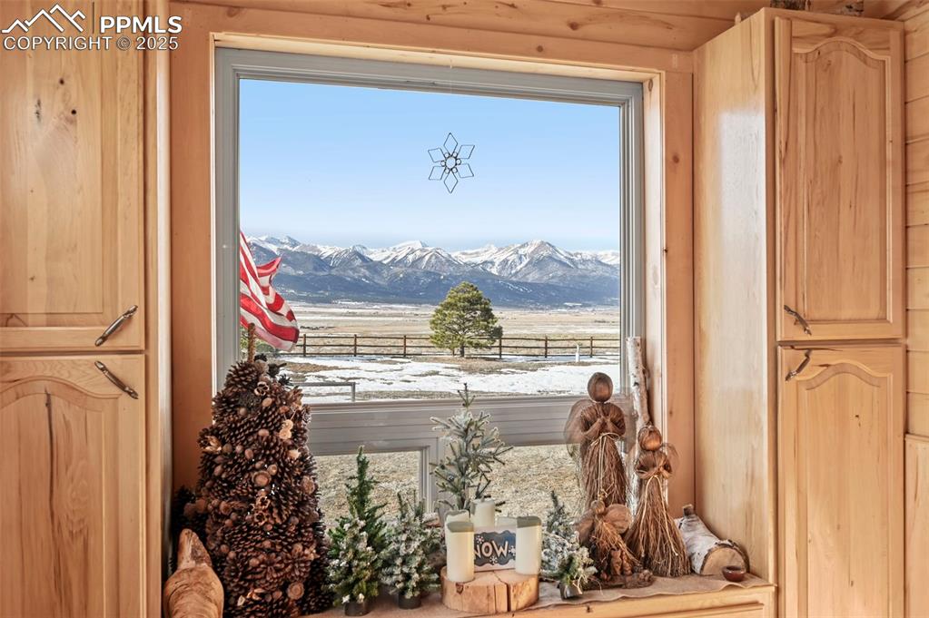 Image 23 of 50: Interior details featuring a mountain view
