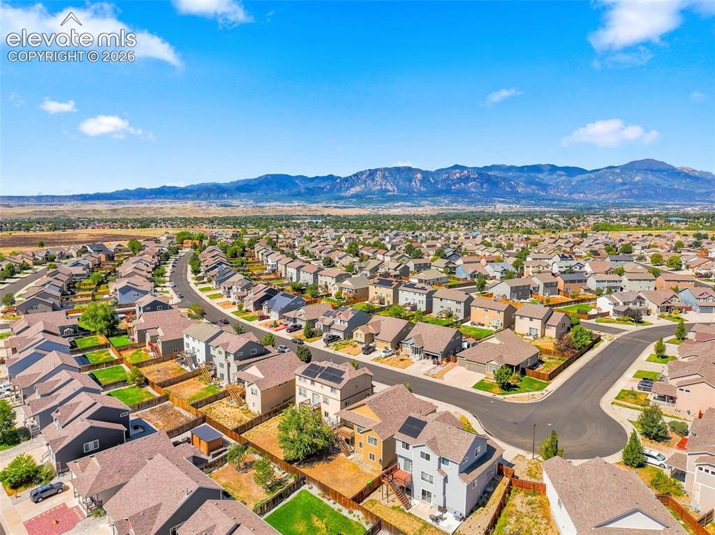 Image 31 of 31: Suburban neighborhood with varied residential architecture