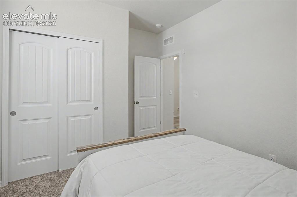 Image 23 of 39: Bedroom