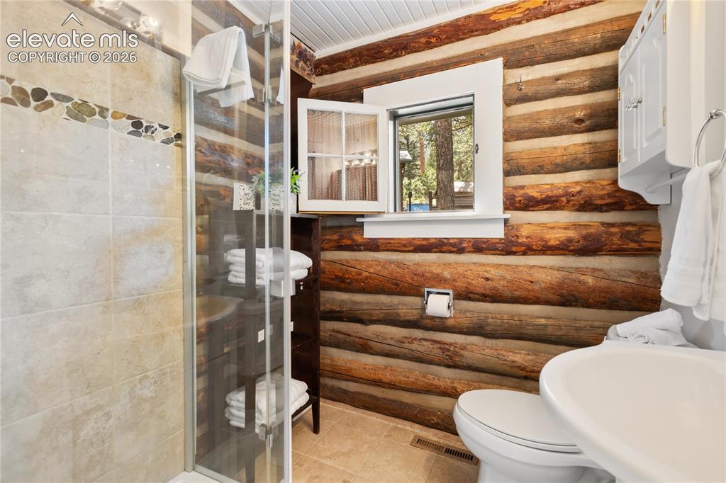 Image 21 of 38: A nicely remodeled bathroom too!