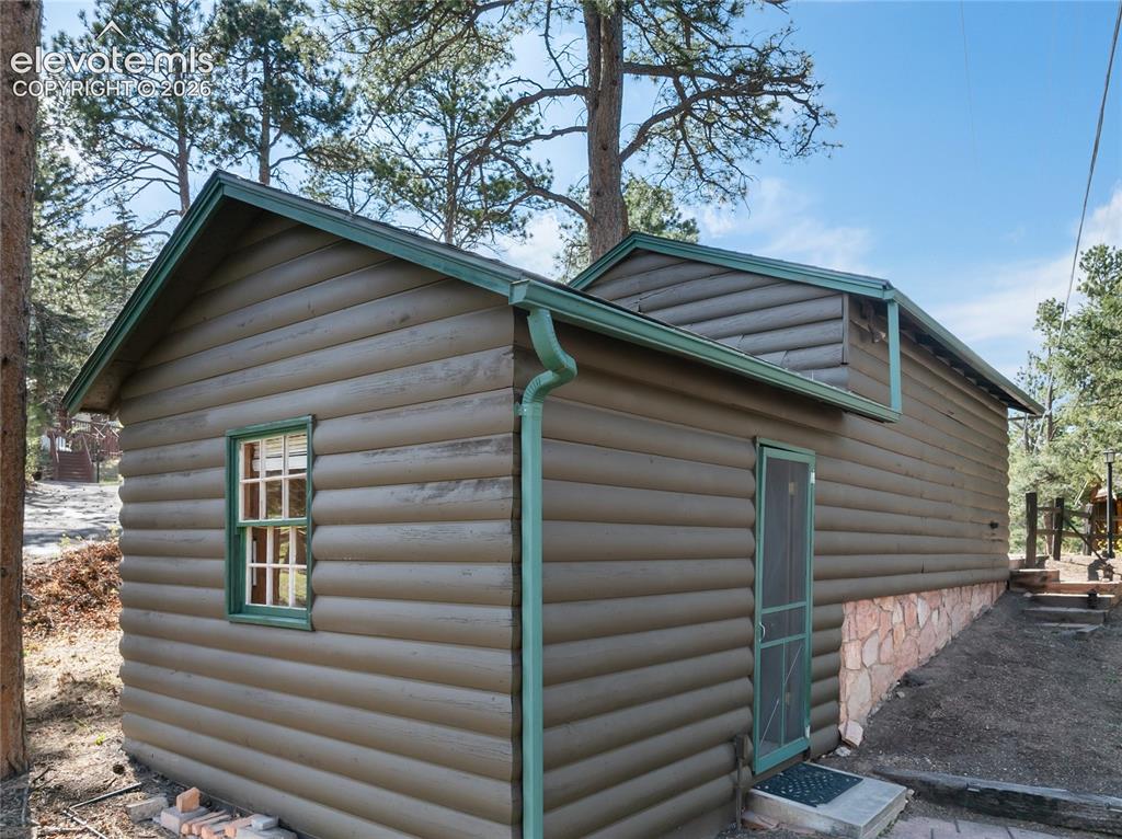 Image 29 of 38: Speaking of bonus rooms.... this is on the back of the garage and the previ