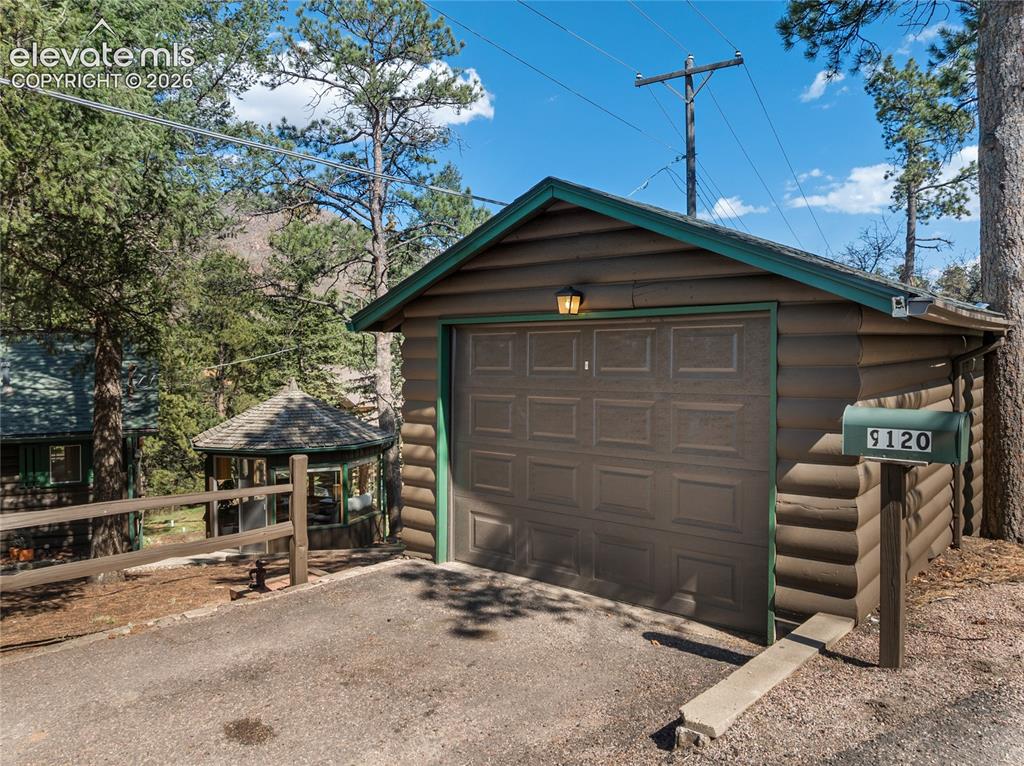 Image 34 of 38: And a one car garage and a driveway that can easily accommodate another 2 c
