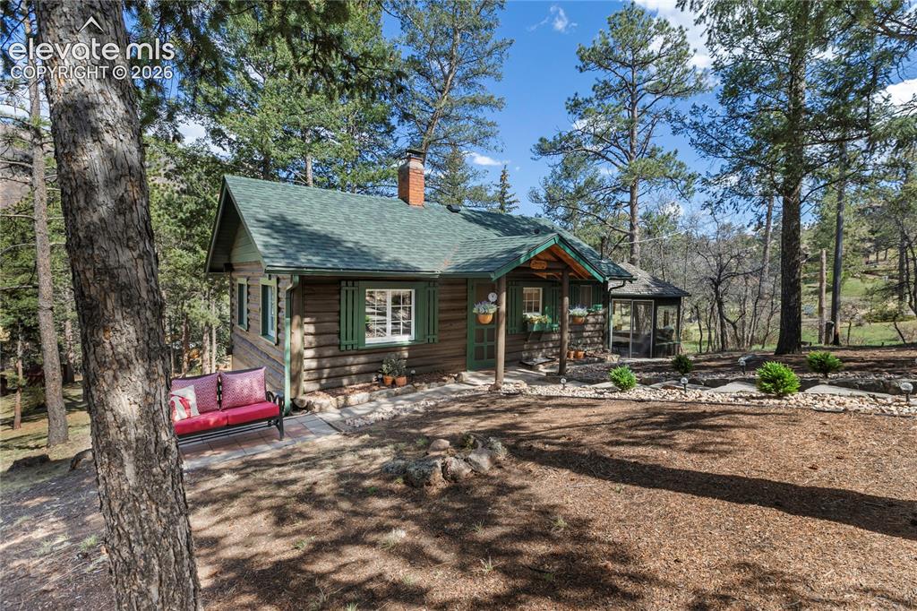 Image 8 of 38: You have a big yard with lots of trees and sunshin!