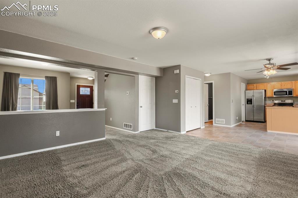 Image 10 of 35: Family Room looking towards dining area and kitchen