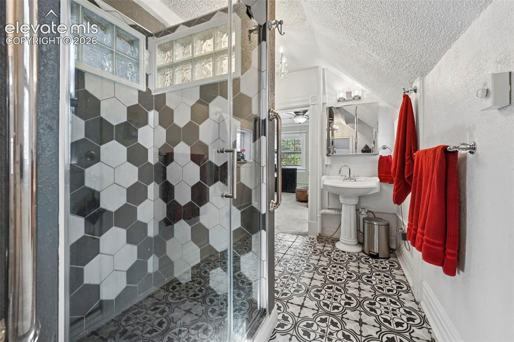 Image 24 of 50: Walk in Tile Shower