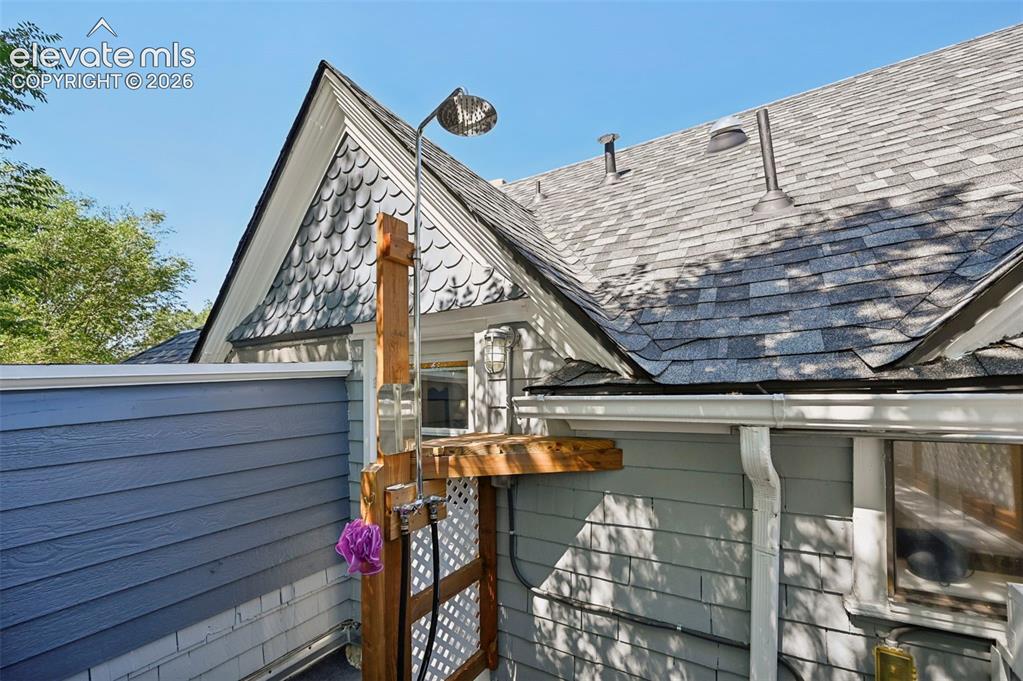 Image 26 of 50: Primary Bathroom Balcony with Outdoor Shower