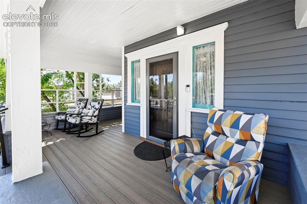 Image 3 of 50: Large wrap around Covered Front Porch