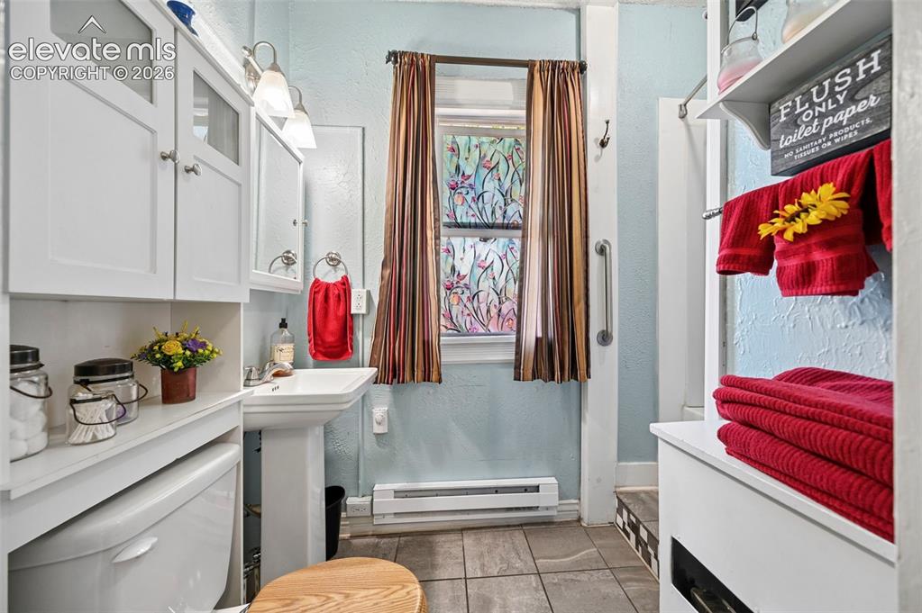 Image 42 of 50: Attached Full Size Bathroom tub/shower