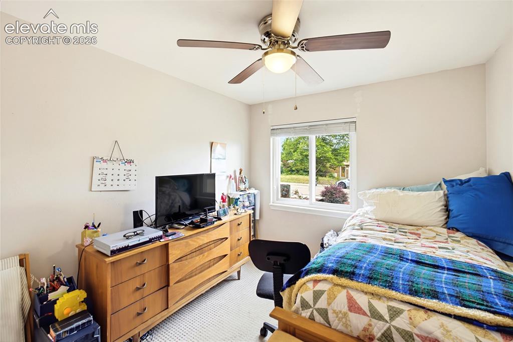Image 26 of 32: Single window with horizontal blinds