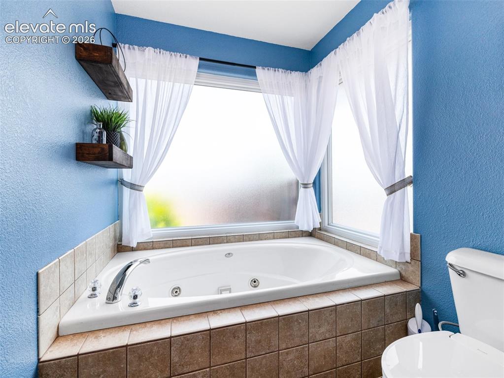 Image 19 of 50: Master Bathroom