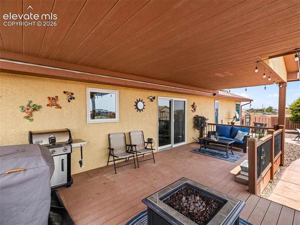 Image 38 of 50: This wonderful space is like an extension to the main level with views of t