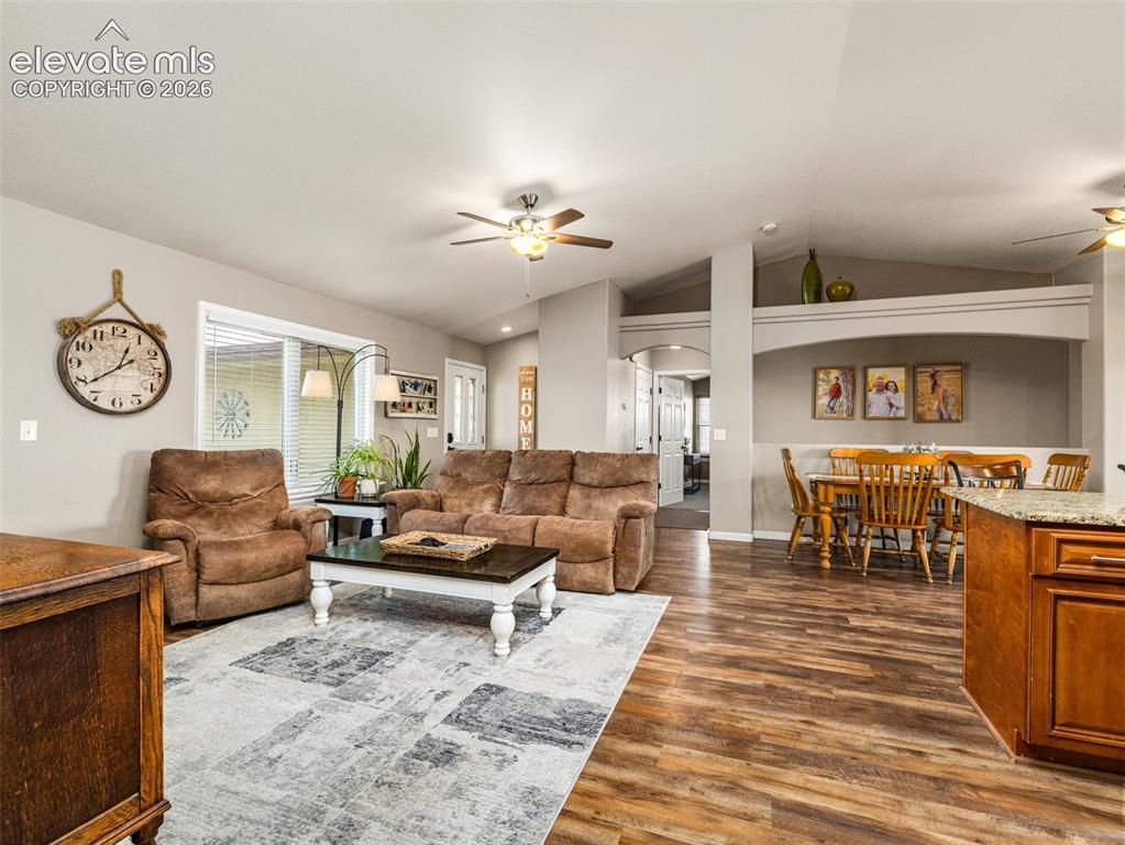 Image 6 of 50: Full view of living room, entrance, dining area