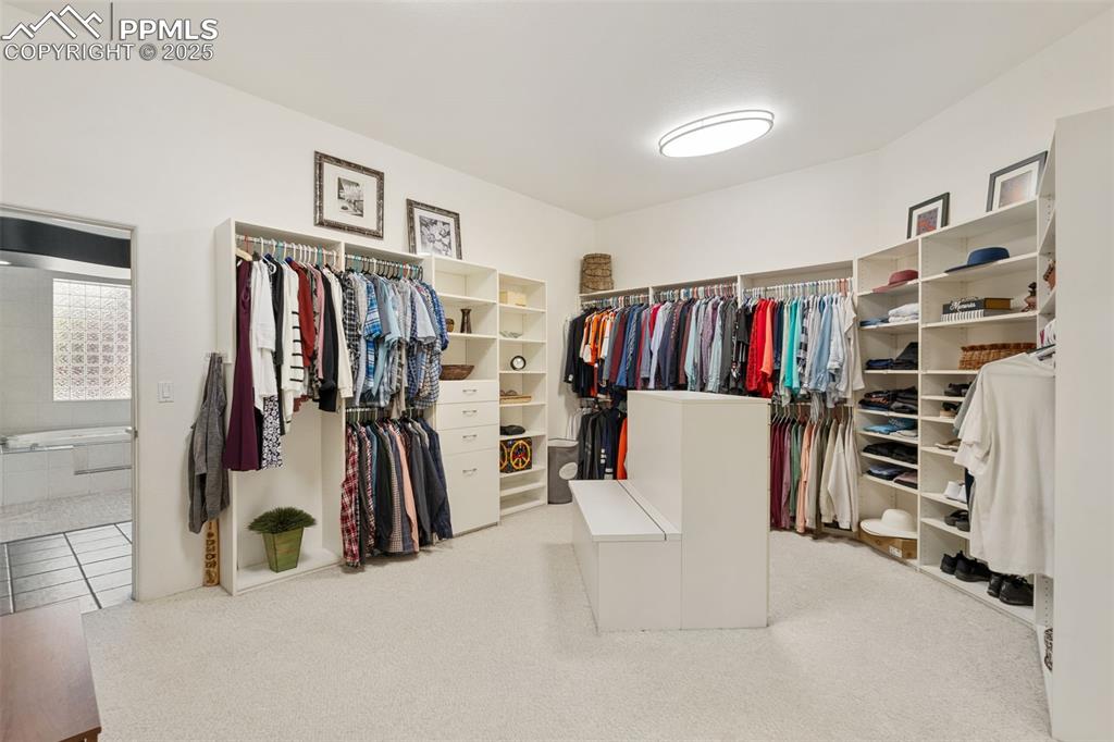 Image 22 of 44: Primary closet
