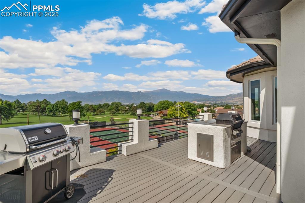 Image 40 of 44: Main level deck with expansive views
