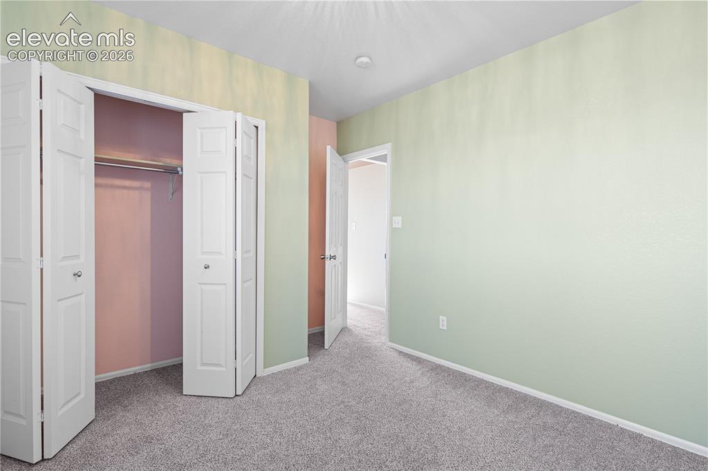 Image 22 of 27: Bedroom