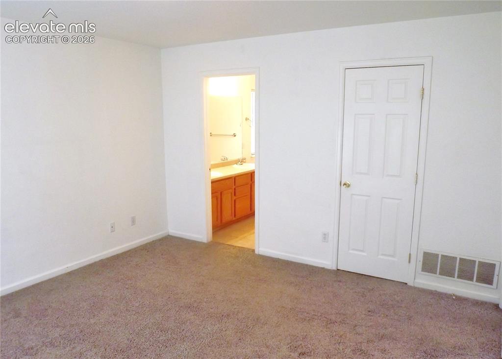 Image 12 of 19: Master Bedroom