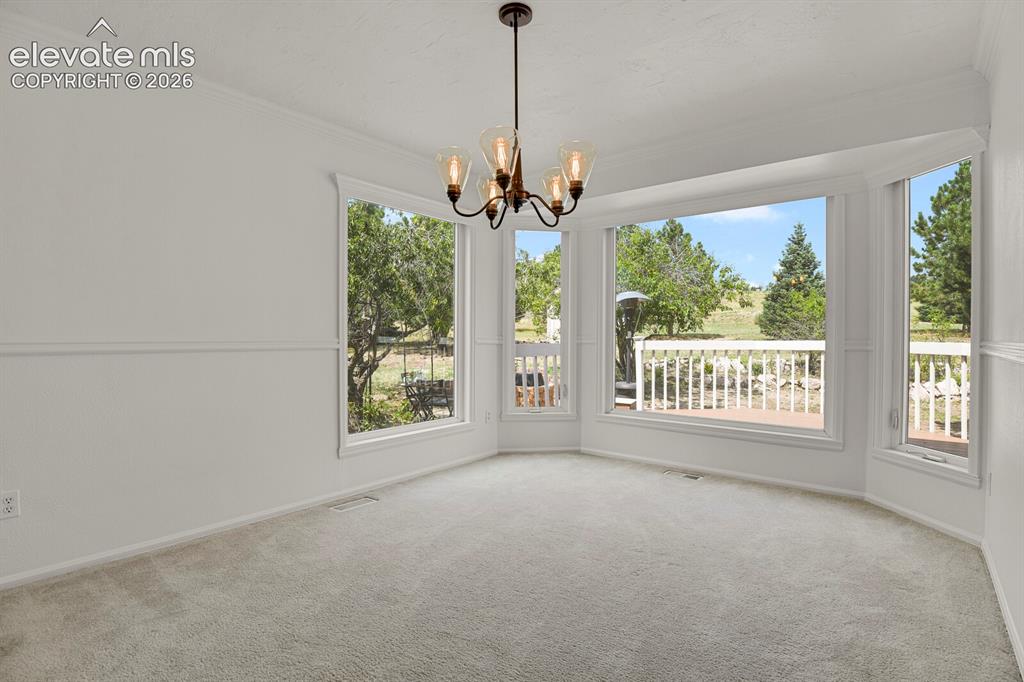 Image 8 of 35: Oversized bay window lets in plenty of natural light