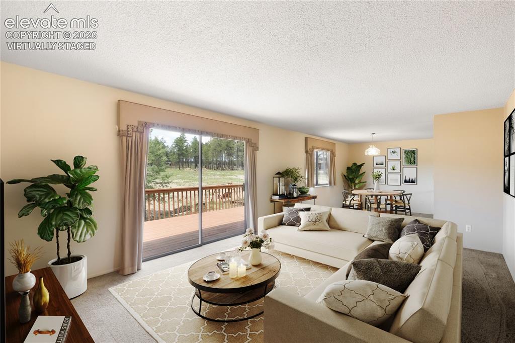 Image 2 of 47: Virtually staged dining and living room
