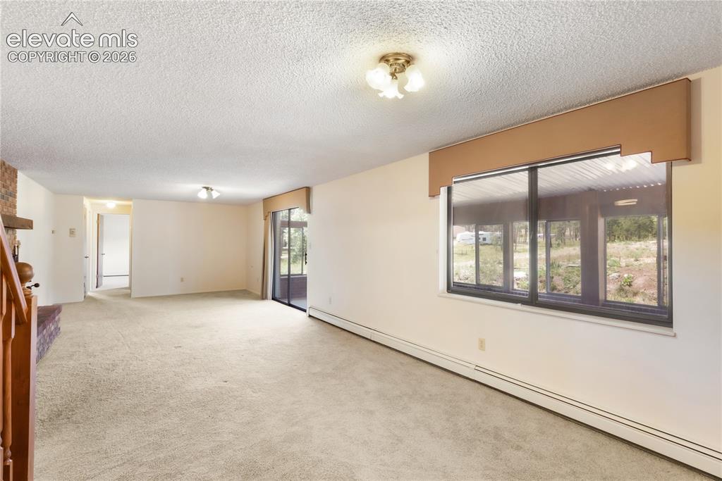 Image 28 of 47: Basement family room