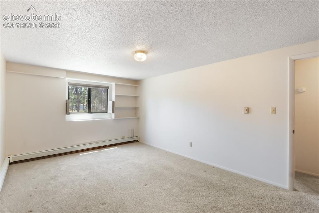 Image 37 of 47: Basement bedroom