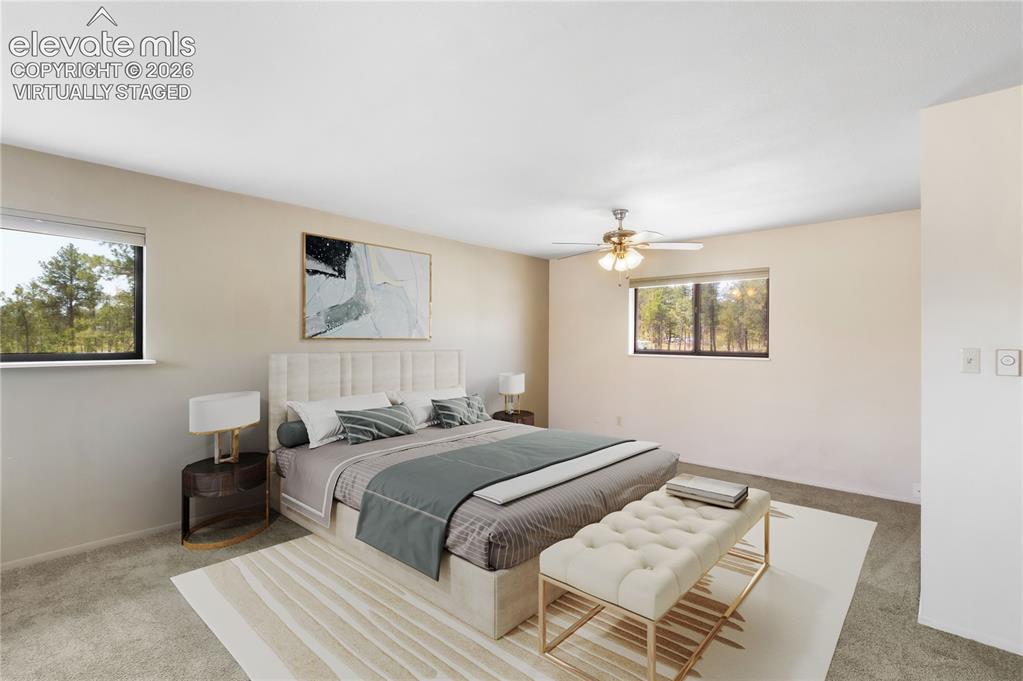 Image 4 of 47: Virtually staged primary bedroom