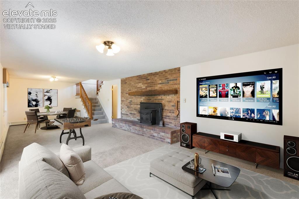 Image 6 of 47: Virtually staged Family room in basement