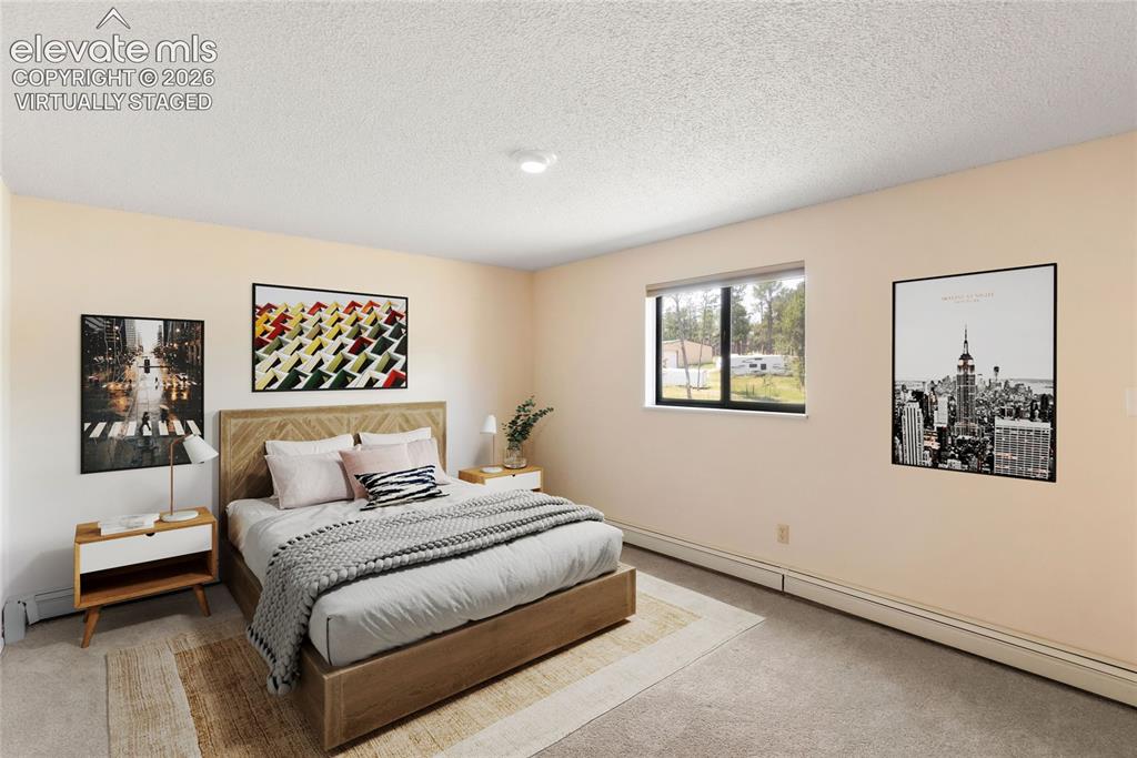 Image 7 of 47: Virtually staged basement bedroom