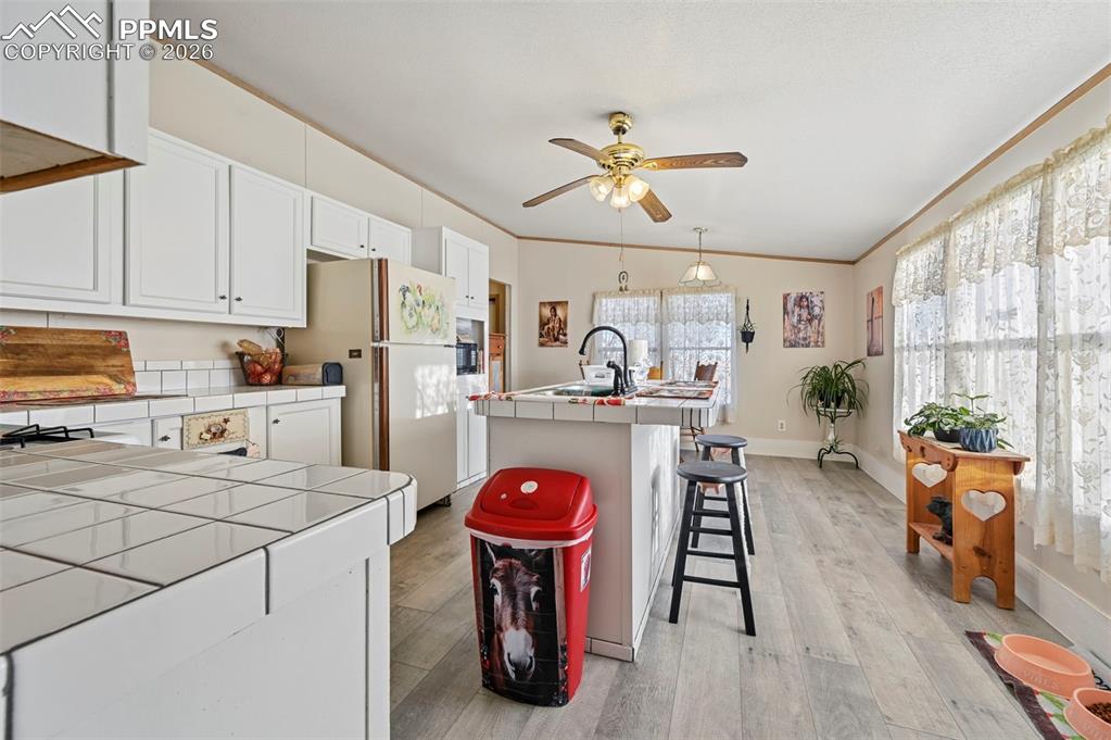 Image 17 of 45: Updated kitchen with center island and ample workspace 