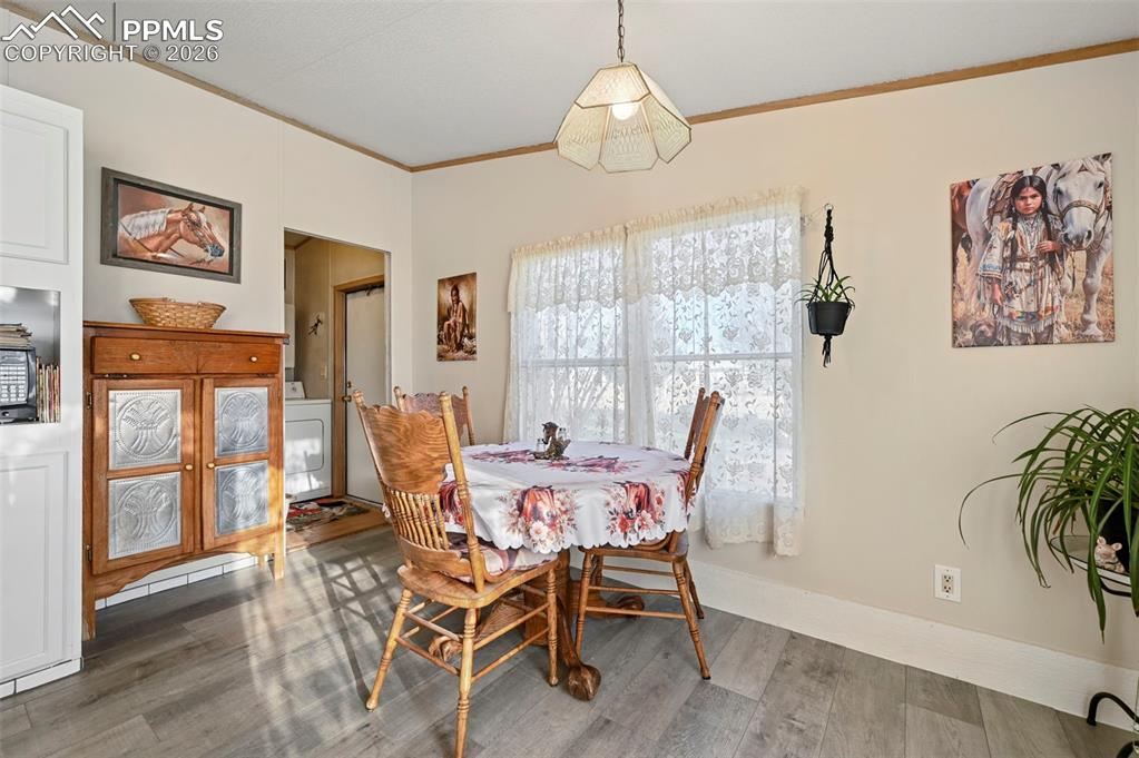 Image 20 of 45: Kitchen and dining area designed for everyday functionality 