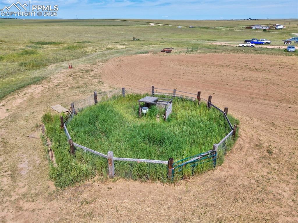 Image 34 of 45:  Livestock setup including round pen and fenced areas 
