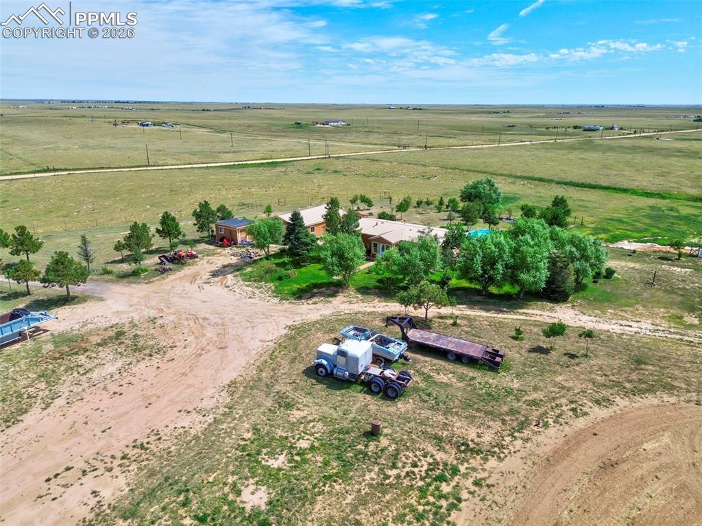 Image 45 of 45:  Final aerial showcasing the full ranch and surrounding environment 