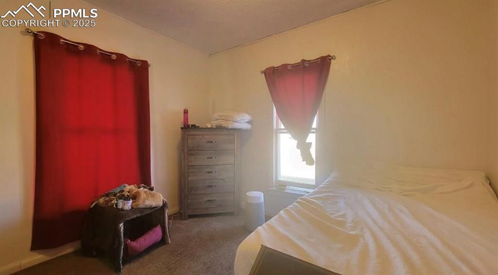 Image 11 of 16: Bedroom