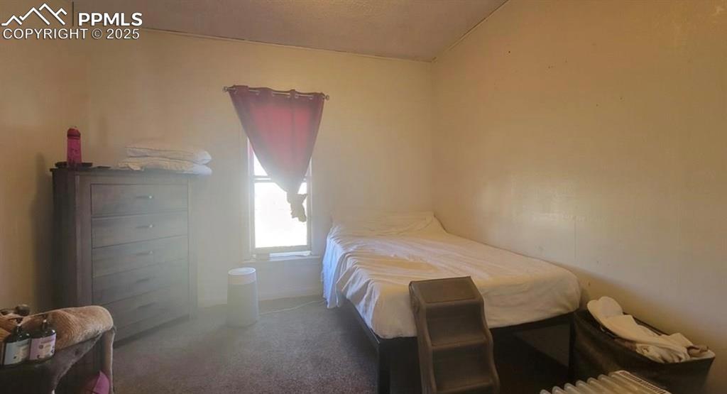 Image 9 of 16: Bedroom