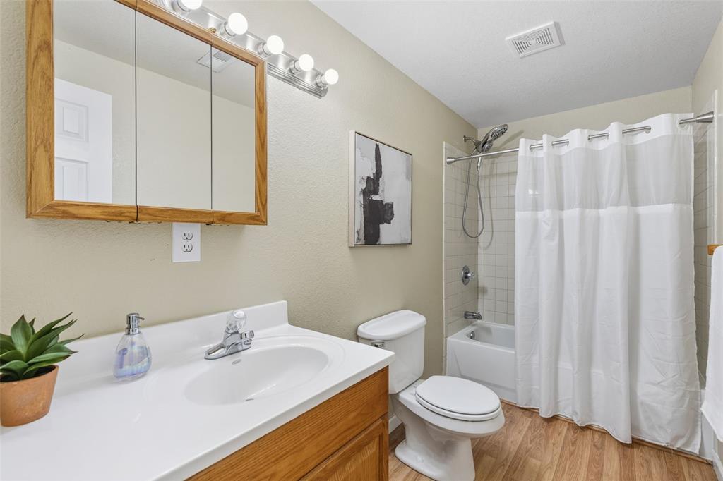 Image 25 of 30: FULL BATHROOM IN BASEMENT