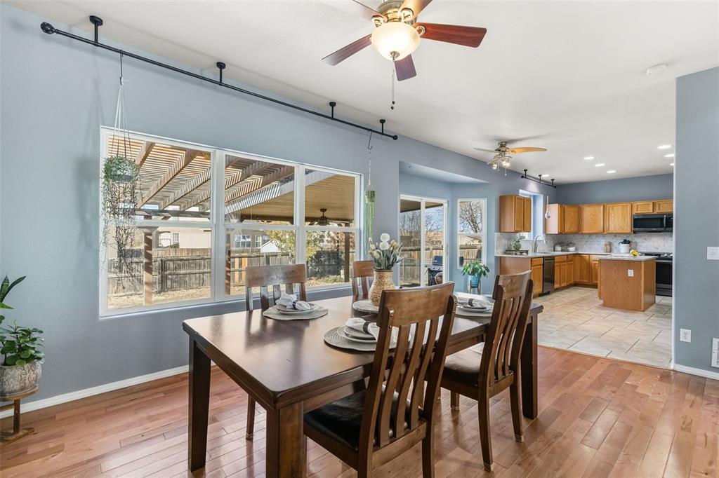 Image 6 of 30: DINING ROOM (COULD ALSO BE A FAMILY ROOM) OPENS TO KITCHEN AND WALK OUT TO 