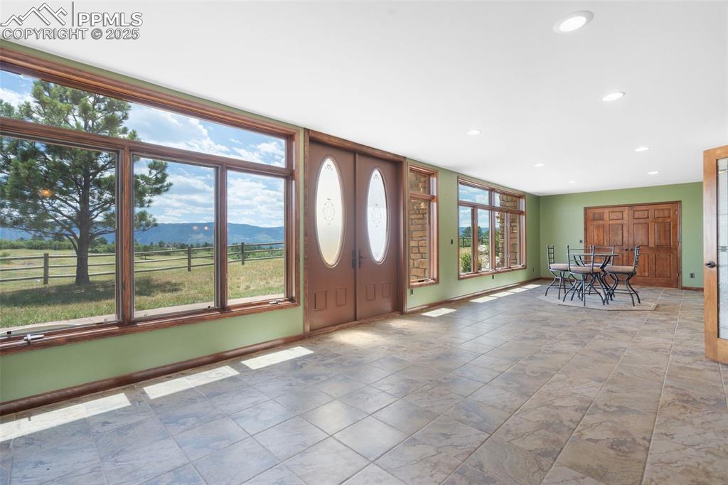 Image 38 of 50: Entrance foyer with recessed lighting, plenty of natural light, and a mount