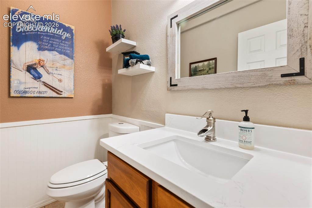 Image 18 of 49: Main level powder room