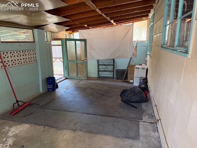 Image 14 of 18: View of patio featuring an exterior structure