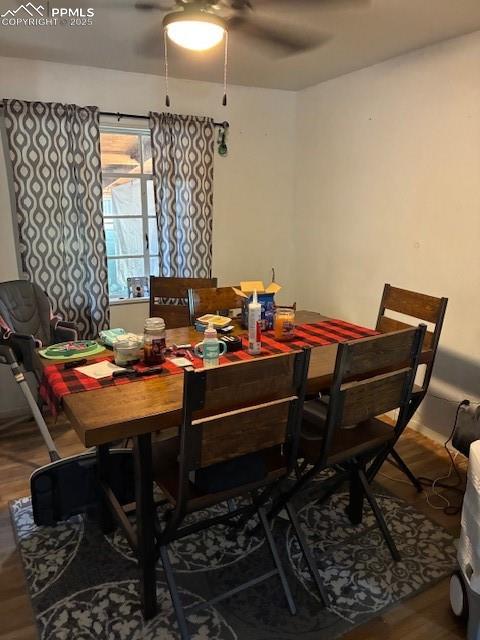 Image 4 of 18: Dining area featuring wood finished floors and ceiling fan