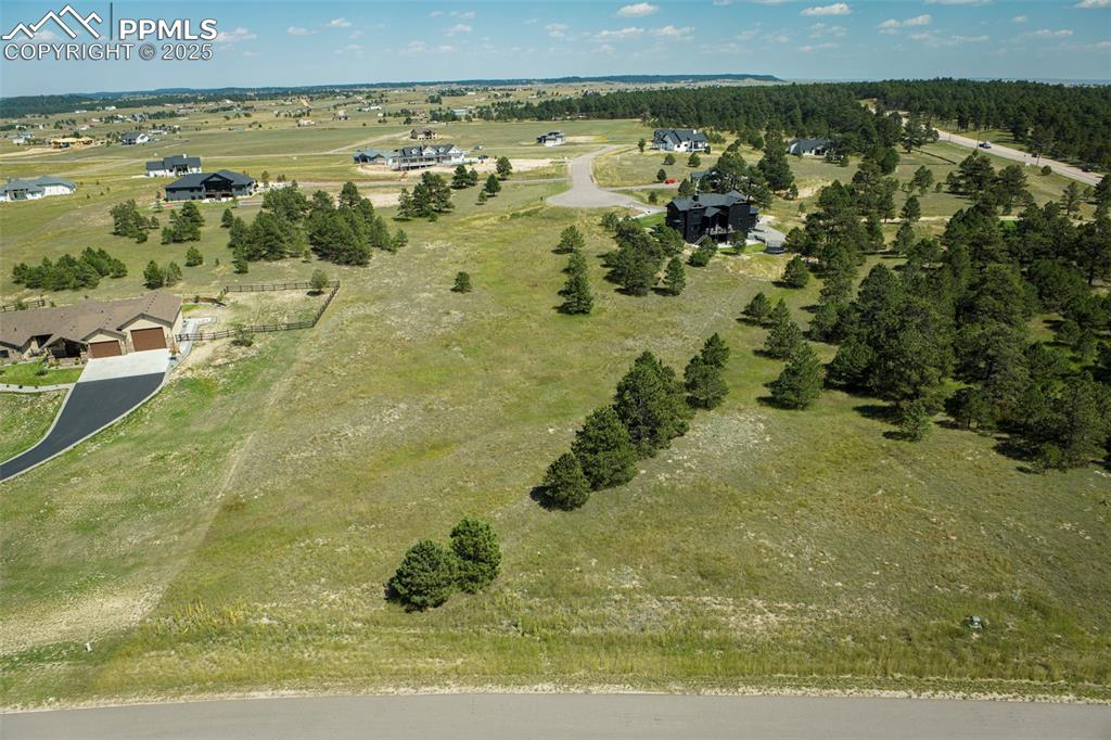 Image 18 of 19: Aerial view of property and surrounding area