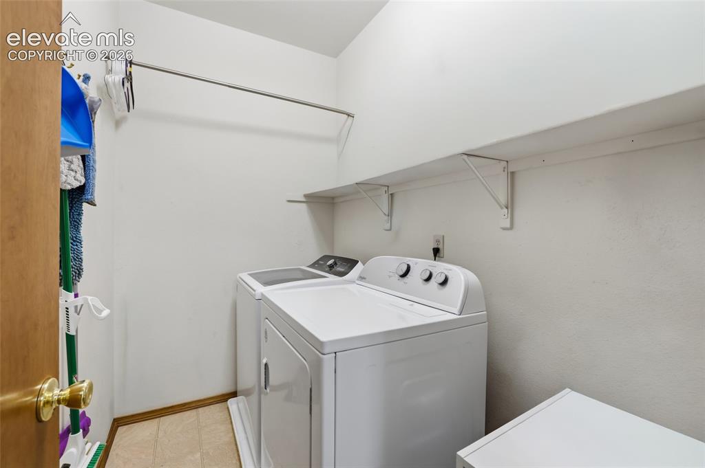 Image 17 of 42: Main level laundry