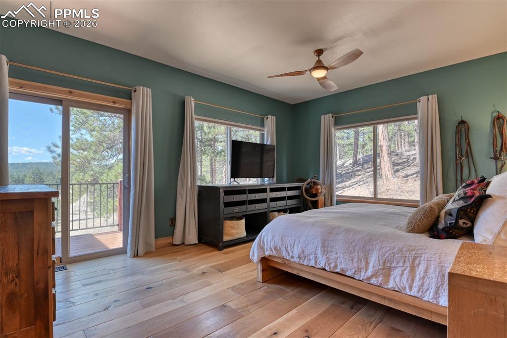 Image 16 of 50: Walks out to back deck with gorgeous views