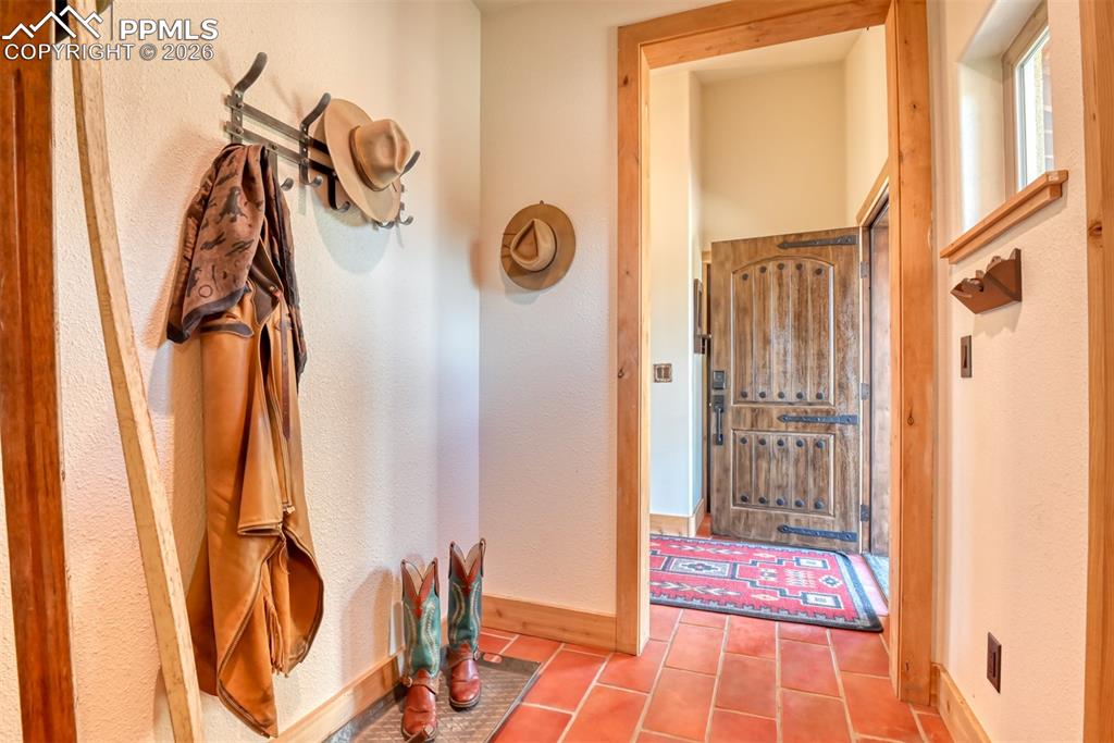 Image 5 of 50: Mudroom located off the entry can also serve as additional pantry space in 