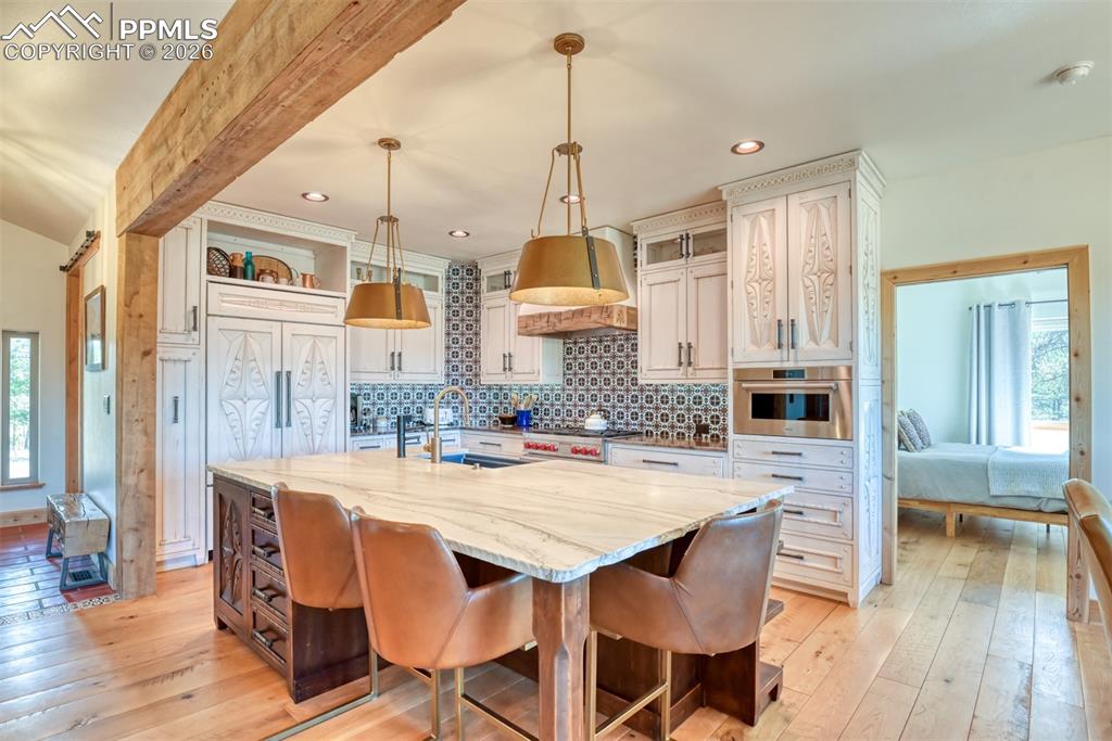 Image 6 of 50: No expense spared on this new custom kitchen with quartize countertops, top