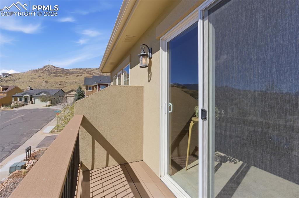 Image 20 of 50: Kitchen featuring stainless steel appliances, wood finish cabinetry, light