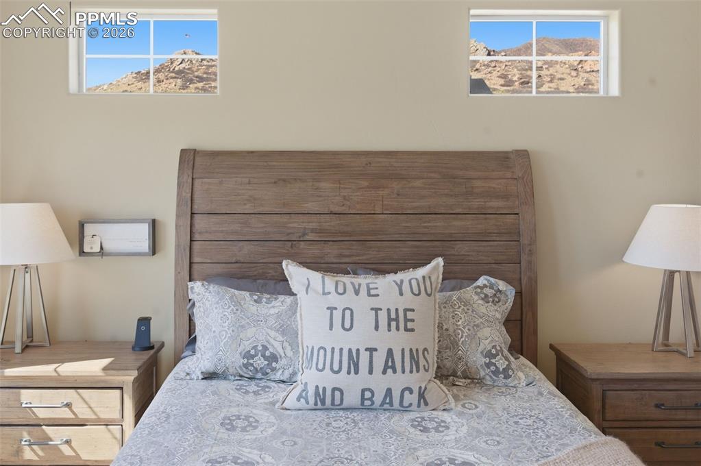 Image 22 of 50: Laundry area with washing machine and clothes dryer